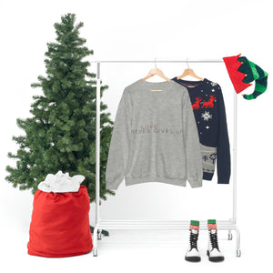 LOVE Never Gives Up-Unisex Heavy Blend™ Crewneck Sweatshirt
